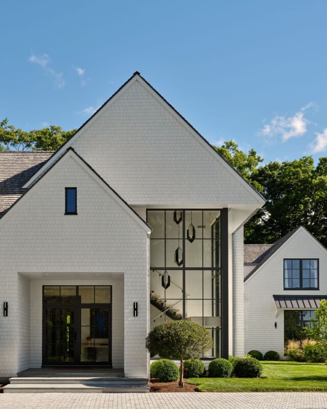 In the News ✨ Thrilled to see one of our cherished projects featured in the 15th anniversary issue of @nehomemagazine CT! 
This home is a refined balance of farmhouse tradition and modern design, wrapped in soft white shingles with expansive glass panels that blur the lines between indoors and out. Thoughtful details, timeless character, and a deep connection to its natural surroundings make this home truly special. 

A heartfelt thank you to @jennatalbott and the @nehomemagazine team for shining a light on this home and thank you to our incredible team and partners on this project. Honored to be part of this milestone issue. 

Developer and Builder: @sbphomes 
Architecture: @apdarchitects 
Interior Design: @sbphomes @nimadesigninteriors  RM Studio 
Landscape design: @sbphomes William Kenny Associates 
Photography: @readmckendree