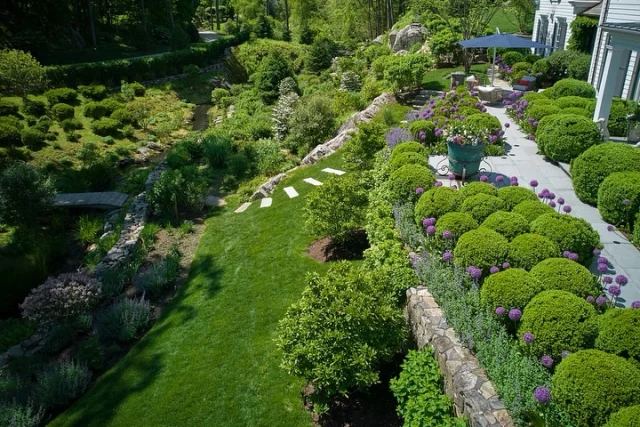 After a few days of rain, there’s something special about stepping into a garden that’s been nurtured by Mother Nature herself. 🌿🌧️ Crafting outdoor spaces that feel truly at home in nature is what we love to do. 
⠀⠀⠀⠀⠀⠀⠀⠀⠀
⠀⠀⠀⠀⠀⠀⠀⠀⠀
#customhome #landscapedesign #garden #outdoorliving #sbphomes
