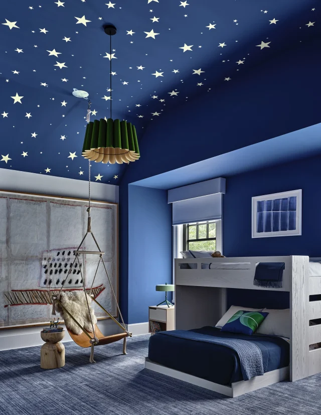There’s nothing quite like falling asleep under the stars—even if they’re hand-painted on your ceiling. ✨
This whimsical room just made @archdigest list of timeless kids’ spaces. Color-drenched in Twilight Blue, this immersive room features a glow-in-the-dark star motif hand-painted —designed to feel like a world of its own. 

Built by us @sbphomes 
Interior design: @changoandco 
Architecture: @shoperenowharton 
Photography: @readmckendree