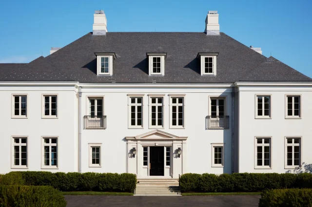 Located in Westport, Connecticut, this waterfront residence pairs classical architecture with a relaxed approach to family living.
Beyond its stately facade, the home opens toward Long Island Sound, with outdoor spaces extending along the waterfront. From a sun-filled pool and shaded porches to a sheltered fire pit, each setting offers a different way to enjoy the property through the seasons. An indoor pool allows for swimming year-around. 

Grand in scale yet comfortable and welcoming, the residence was built as a forever home, bringing family and friends together for generations to come.

Project seen in @luxemagazine May/June 2026

Built by @sbphomes 
Architecture: @mitchell_studio 
Interior Design: @dkda 
Landscape Architecture: @hoblynandco 
Exterior Photography: @timlenzphoto 
Interior Photography: @petermurdock_photo 

#coastalhome #luxemagazine #sbphomes